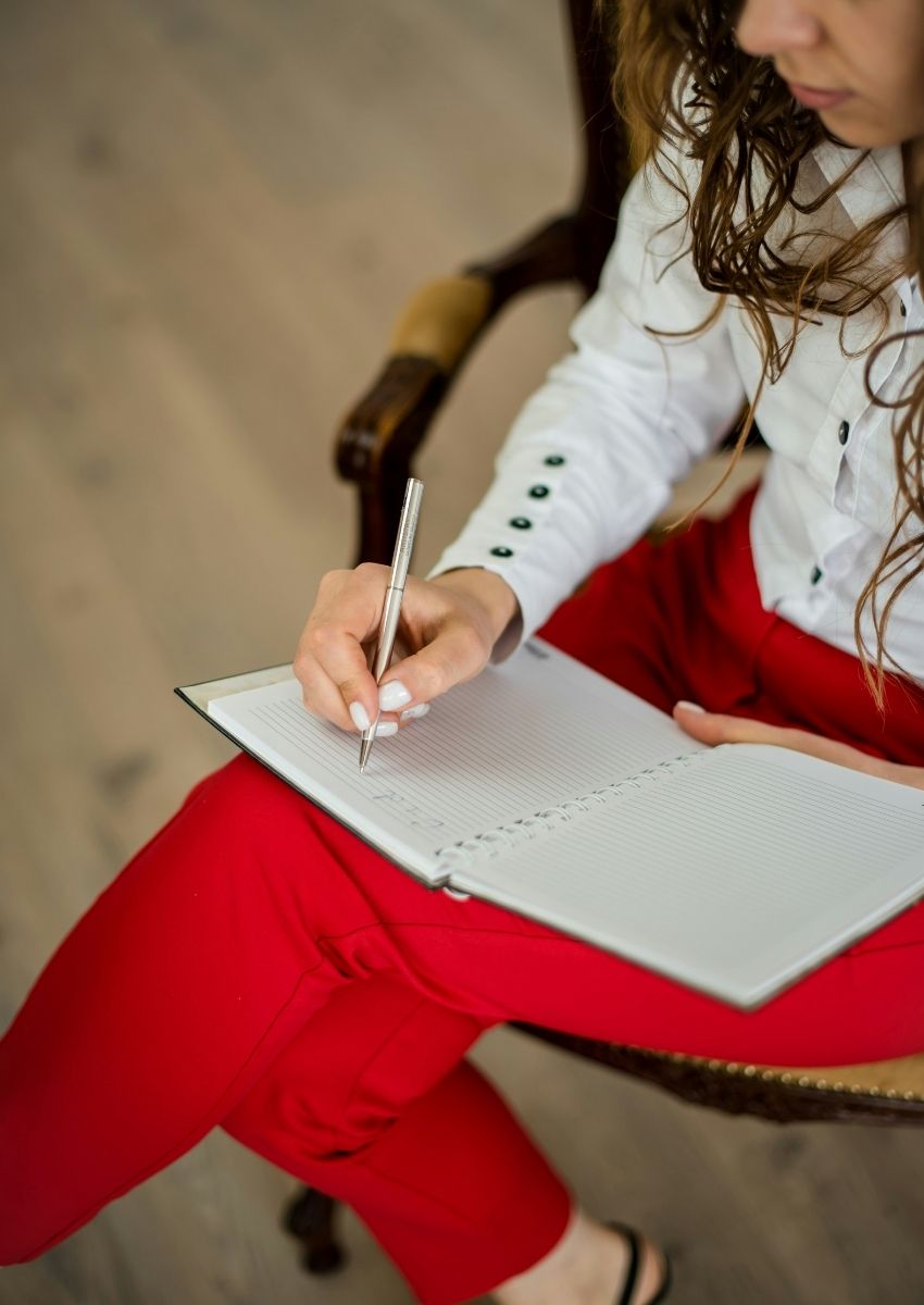 Therapist taking notes in a session