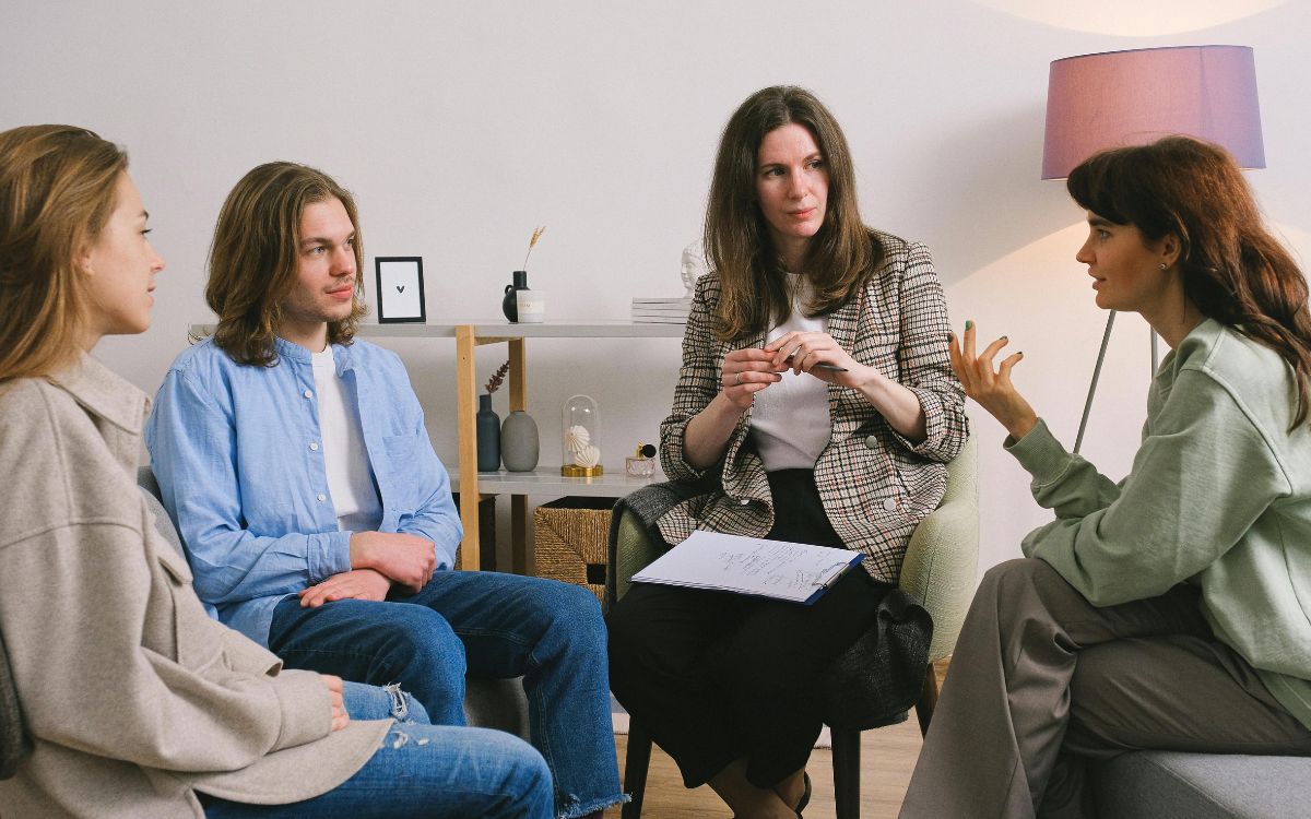 A group therapy session with family members